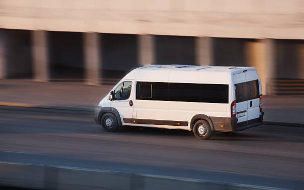 istock minibus goes on city road 488392935