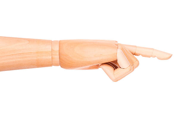 istock wooden finger pointing or touching 488393133