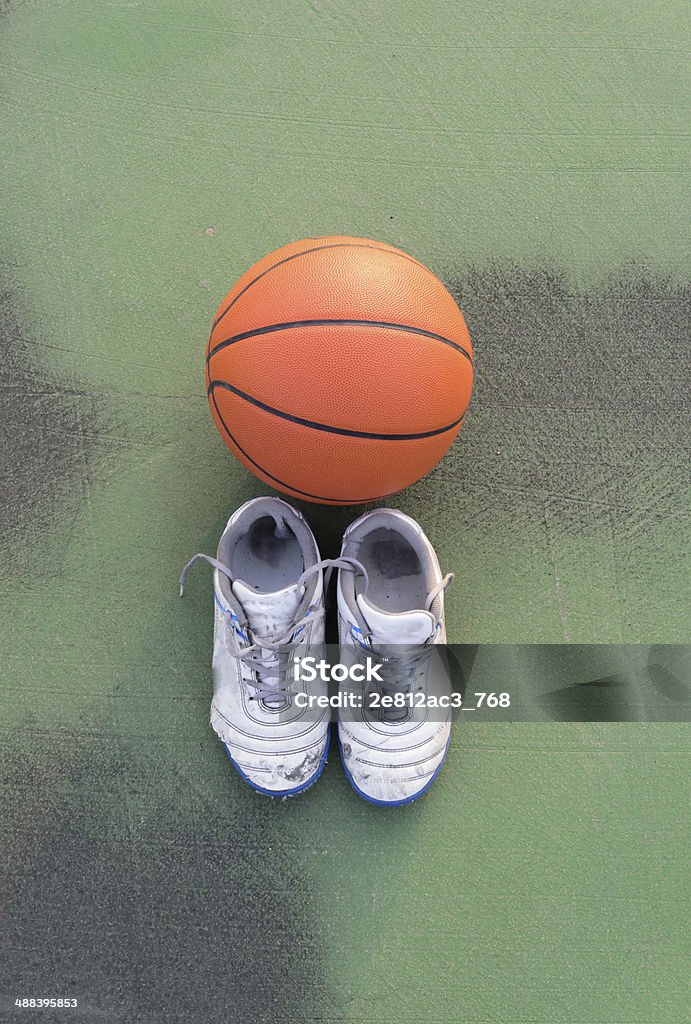 Sport shoes and basket ball Activity Stock Photo