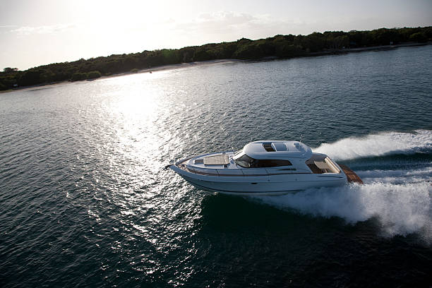 istock Smal motor boat sailing across the coast 488403548