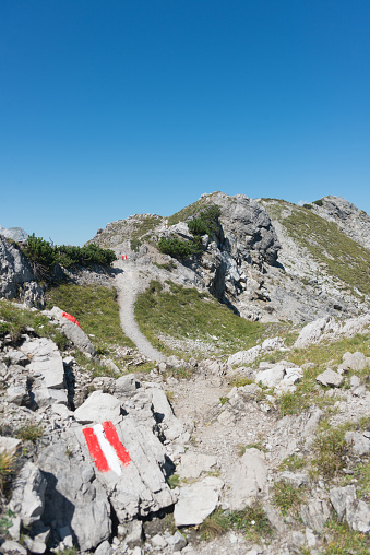 footpath in mountain panorama at karwendel european alps. Path on Hahnkampl