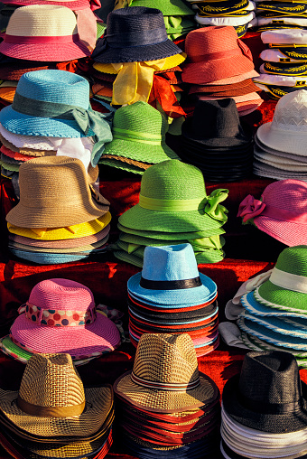Handmade Panama Hatss or Paja Toquilla hat or sombrero at the traditional outdoor market in Cuenca, Ecuador. Popular souvenir from South America