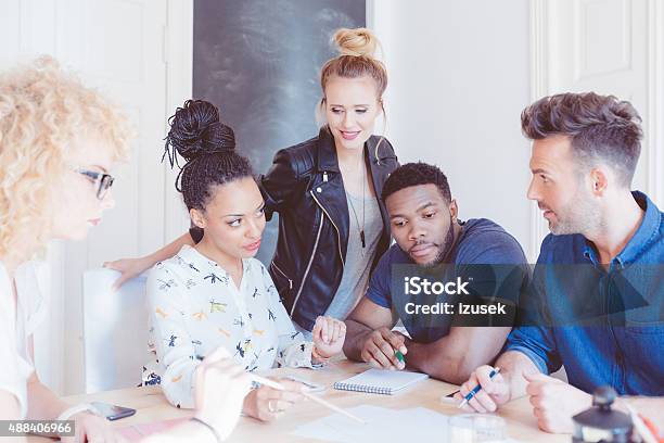 Startup Agency Multi Ethnic Team Brainstorming Stock Photo - Download Image Now - 2015, Adult, African Ethnicity