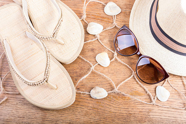 istock Summer woman stuff on wooden background 488407480