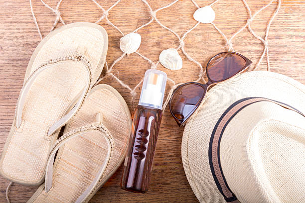 istock Summer woman stuff on wooden background 488407532