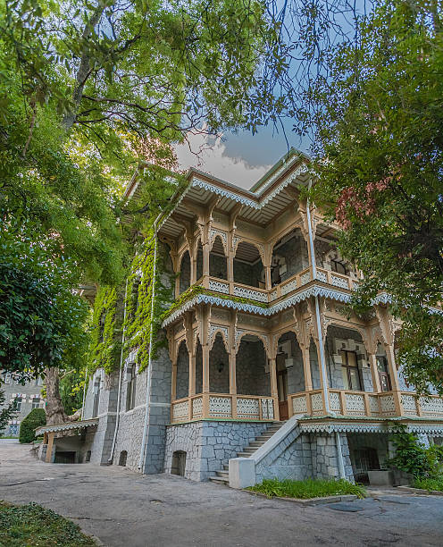 istock Historic building covered with green ivy 488408132