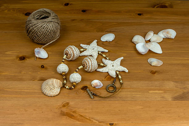 istock Crochet white-beige beads handmade and crocheted starfish 488408418