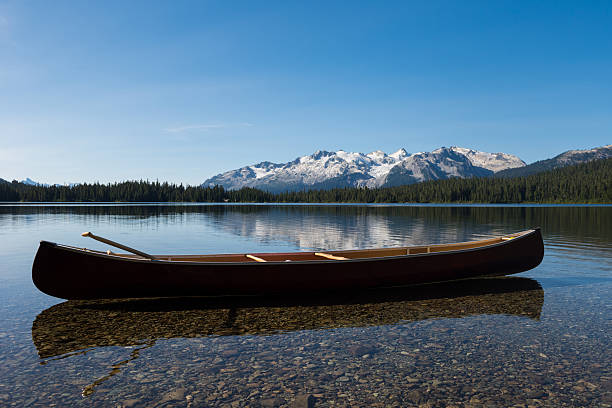 istock Canoe on a prisitine lake 488410936