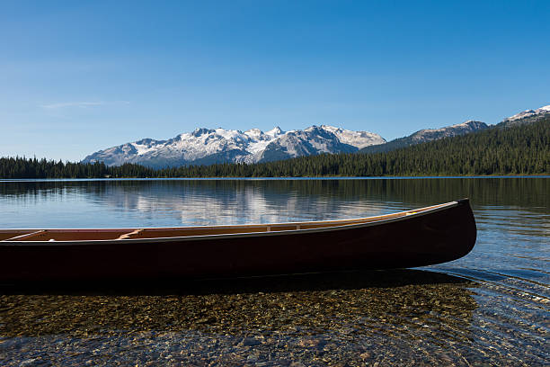 istock Canoe on a prisitine lake 488411046