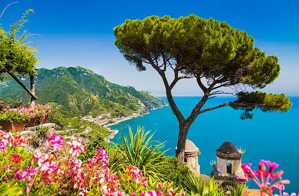 Scenic picture-postcard view of famous Amalfi Coast with Gulf of Salerno from Villa Rufolo gardens in Ravello, Campania, Italy.