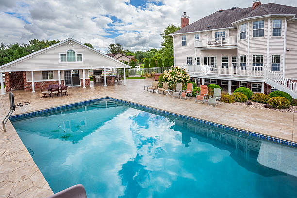 istock Stunning Mansion Home with Swimming pool and pool-house. 488428630
