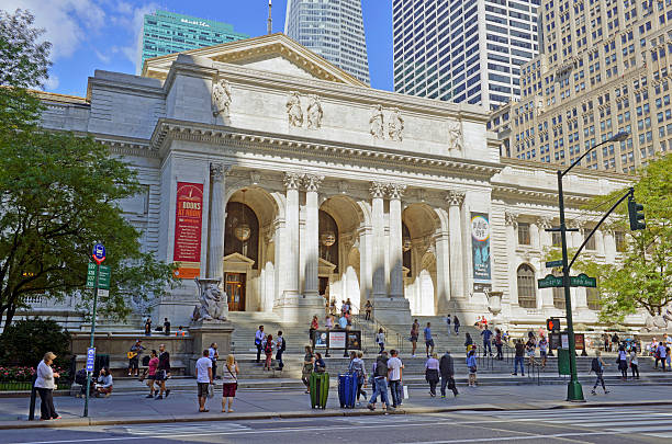 New York, USA - September 14, 2015: The New York Public Library on Fifth Avenue while being an active library filled with students is also a main tourist attraction for visitors in Manhattan.