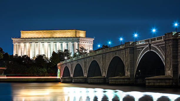 Lincoln Memorial and Arlington Bridge Lincoln Memorial and Arlington Bridge, in Washington DC, by night arlington memorial bridge photos stock pictures, royalty-free photos & images