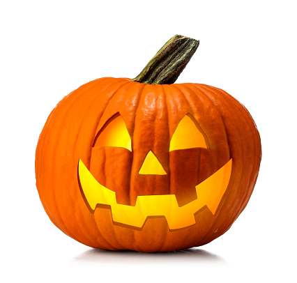 A Halloween pumpkin / jack o lantern on a white background.  The pumpkin has a smiling face and is glowing from the internal illumination.  The jack o lantern is a studio shot and has a attached clipping path.  Please see my portfolio for other holiday images. 