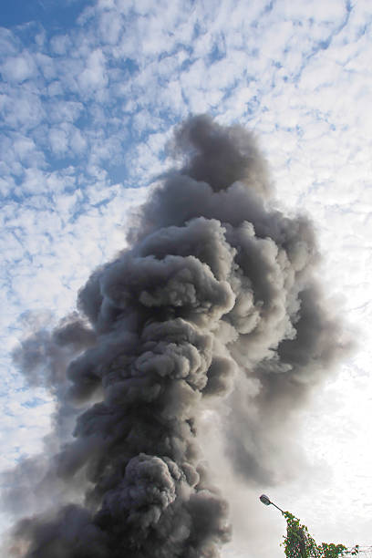 istock Black smoke from someone's house, call 911 488433648