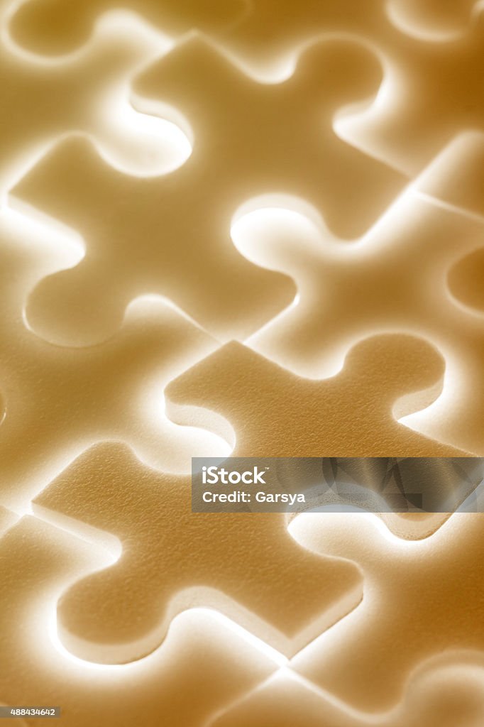 Background of large shining puzzles Background of large shining puzzles in brown 2015 Stock Photo
