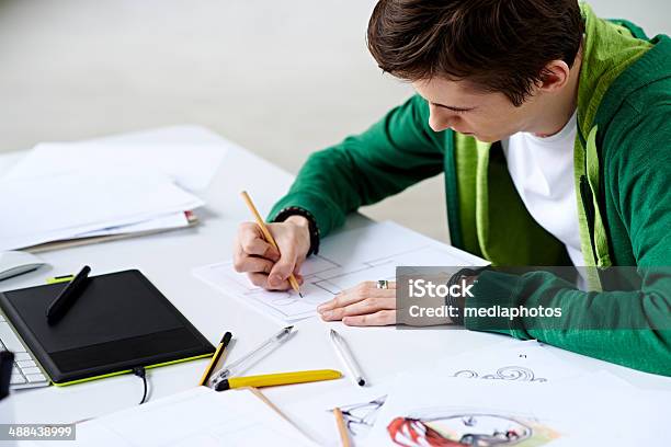 Creating Comics Stock Photo - Download Image Now - 20-29 Years, Adult, Adults Only