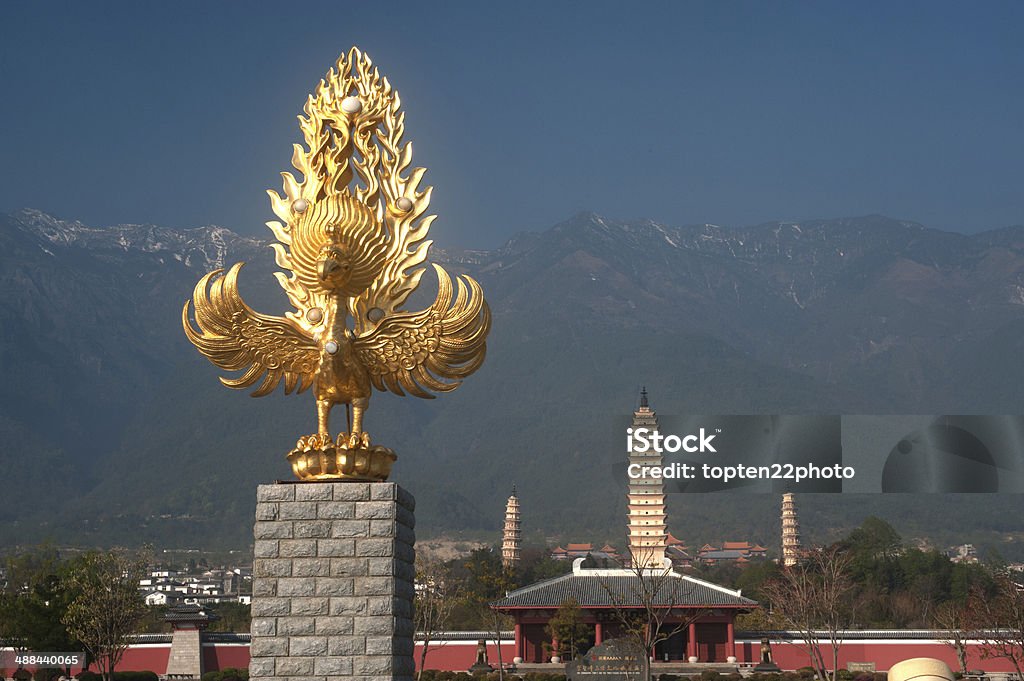 The Chongsheng temple and three pagodas culture tourist area. The Phoenix statue front of Chongsheng temple and three pagodas culture tourist area in Dali ,Yunnan province in Southwestern of China. Antiquities Stock Photo