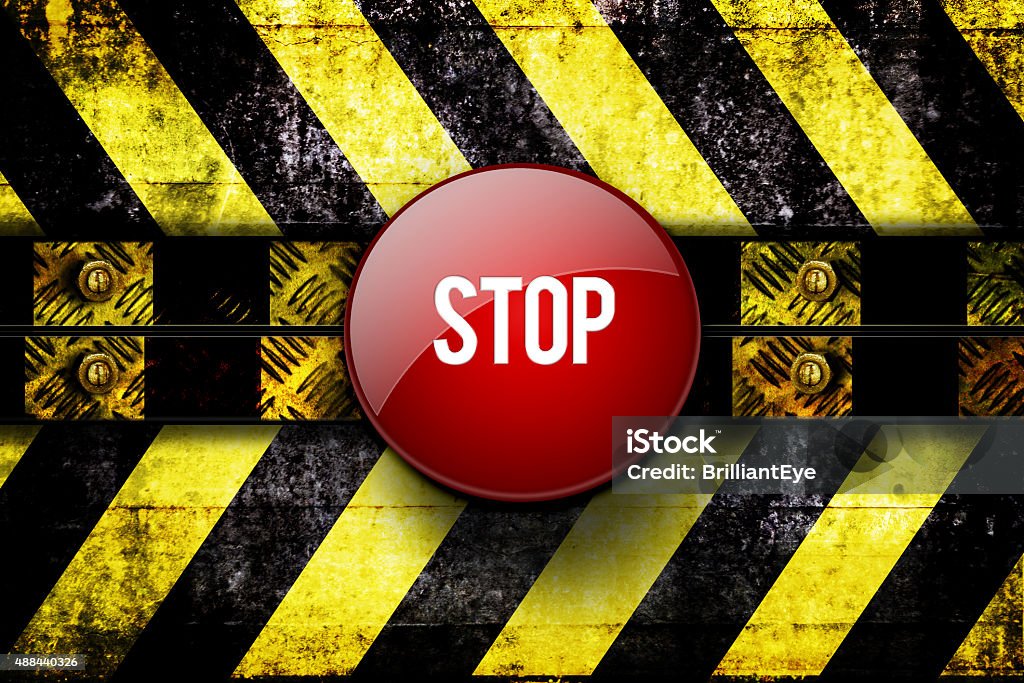 stop button in front of warning area 2015 Stock Photo