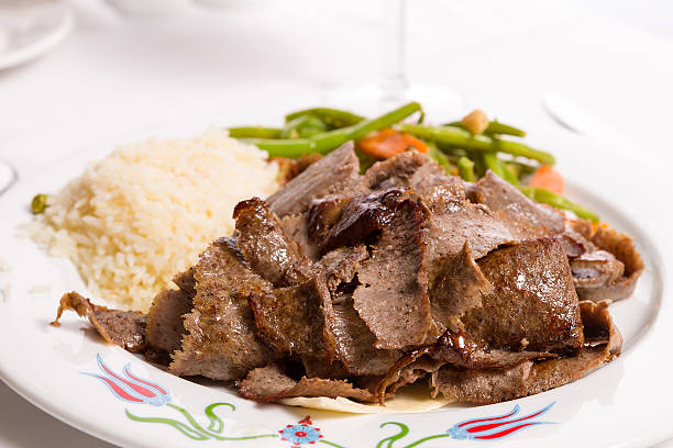 Gyro Doner Garnished with Rice Pilaf and Vegetables