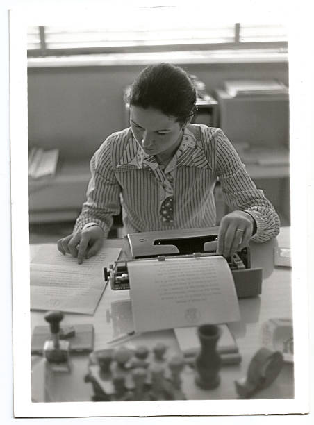 istock Young 1970s woman working 488442577