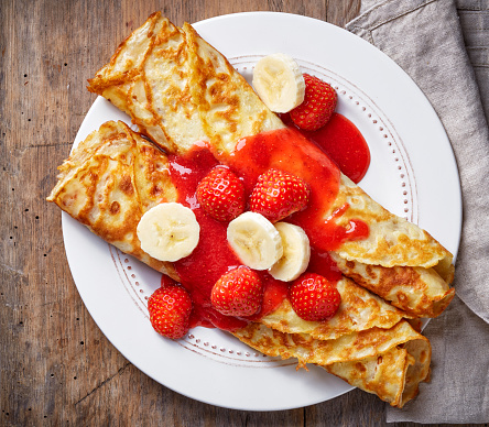 Crepes with strawberries and banana