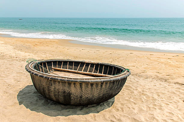 Dai Beach Crab Vietnam Coracle on Cua Dai Beach in Vietnam basket boat stock pictures, royalty-free photos & images