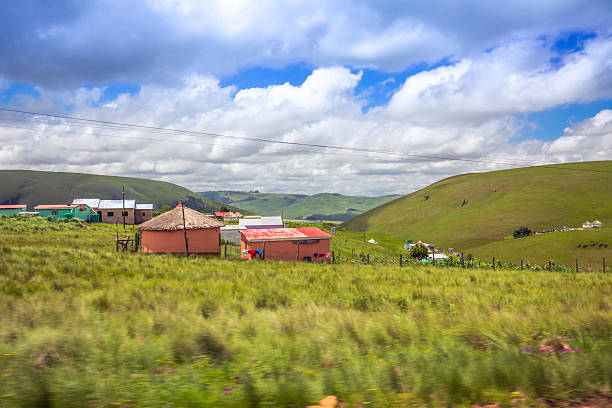 Shantytown to the road to Drakensberg District, South Africa. Poverty and decay