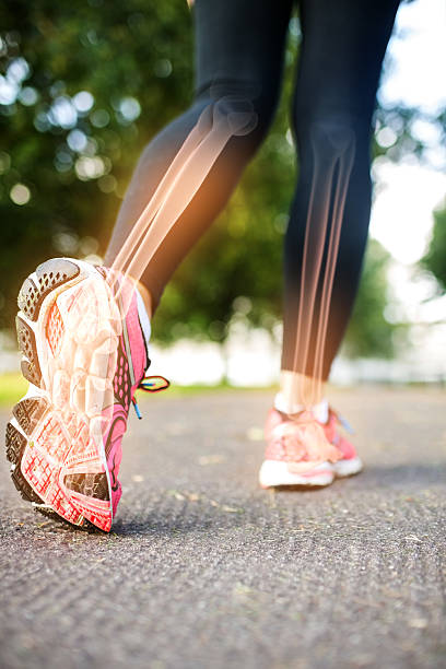 istock Highlighted foot bones of jogging woman 488466076