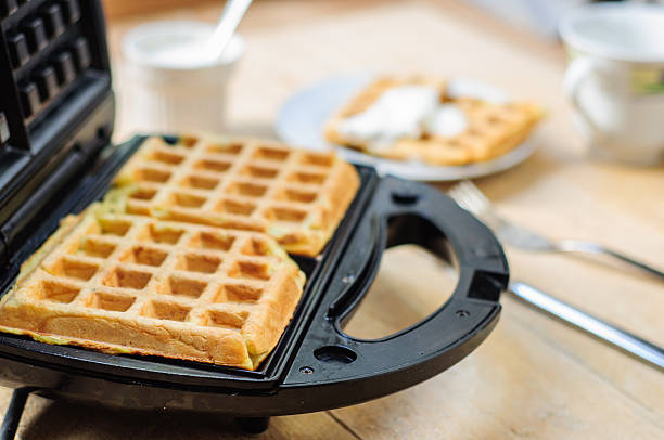 istock Zuccini hash brown waffles with sour cream 488466360