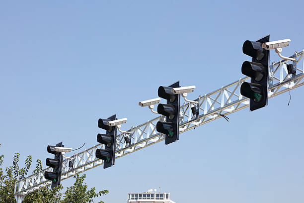 istock traffic surveillance cameras and traffic lights 488467470