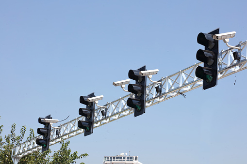 traffic surveillance cameras and traffic lights  on highway