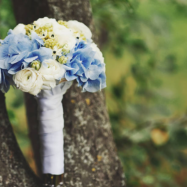 istock stylish wedding bouquet on wooden background 488468910