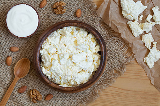 istock Homemade cottage cheese healthy dairy product with nuts in rustic 488471620