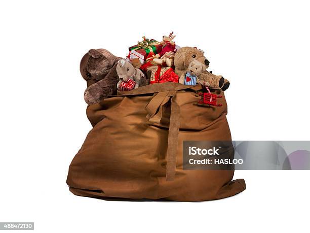 Santa Claus Gift Bag Full Of Toys And Gifts Stock Photo - Download Image Now - Bag, Toy, Christmas