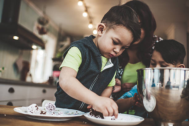 istock Family in the kitchen baking 488472465
