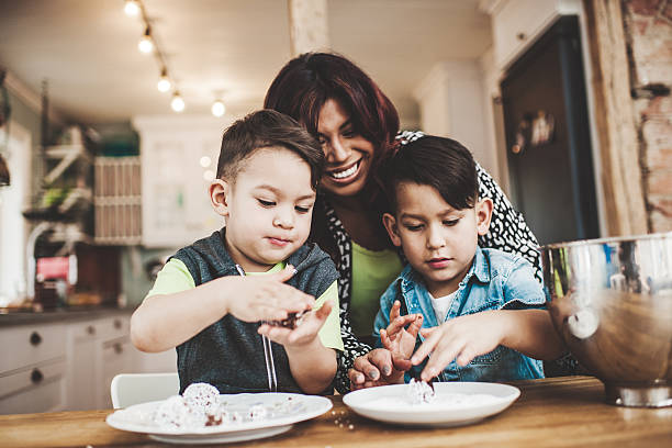 istock Family in the kitchen baking 488472467
