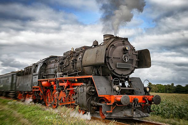 istock Steam locomotive driving fast 488473026