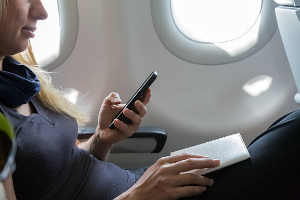 istock Air Flight Passenger Sitting in Aircraft 488474266