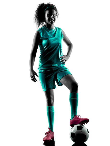 teenager girl soccer player isolated silhouette one teenager girl child  playing soccer player in silhouette isolated on white background soccer player photos stock pictures, royalty-free photos & images