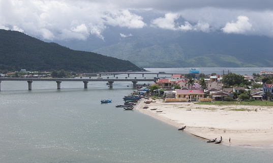 Hue, Vietnam - September 26, 2009: View of Lang Co town and the bridge in Hue, Vietnam. Lang Co has a well known beach and resort.