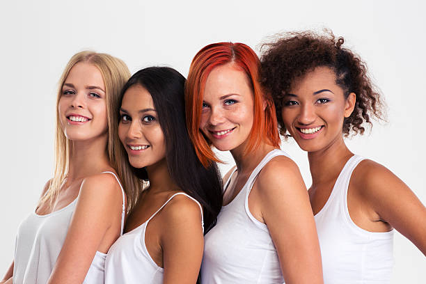 istock Four girls standing in a row 488474914