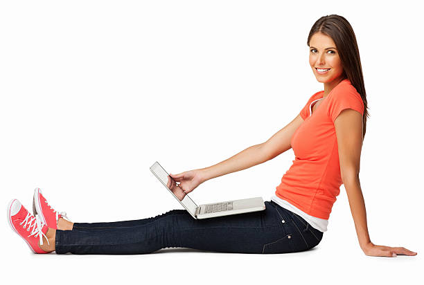 istock Woman With Laptop Sitting On Floor - Isolated 488475729