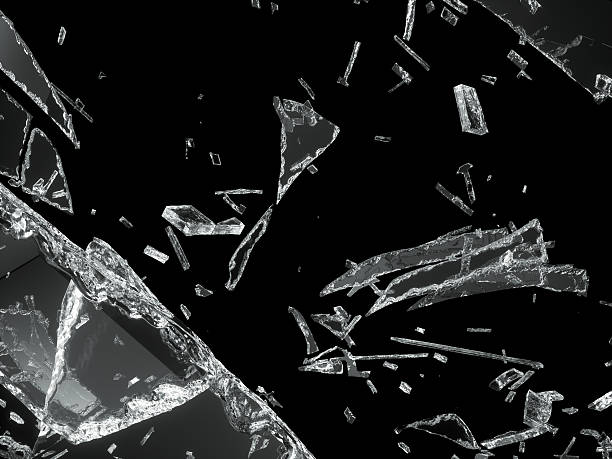 istock Destructed or Shattered glass isolated on black 488476427
