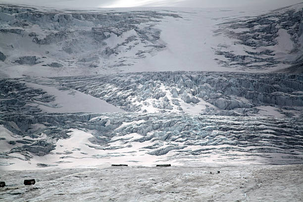 istock Tour groups at the base of a glacier 488477485