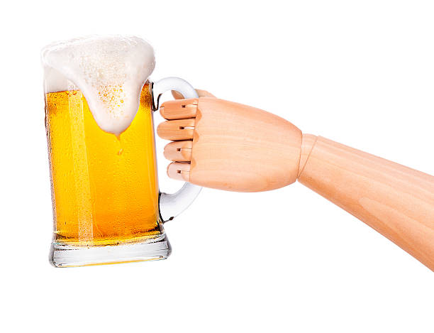 istock beer with wooden hand making toast 488478907