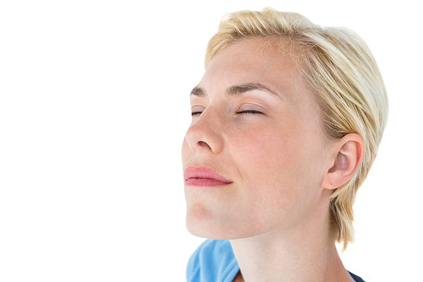 istock Happy blonde woman smiling 488481518