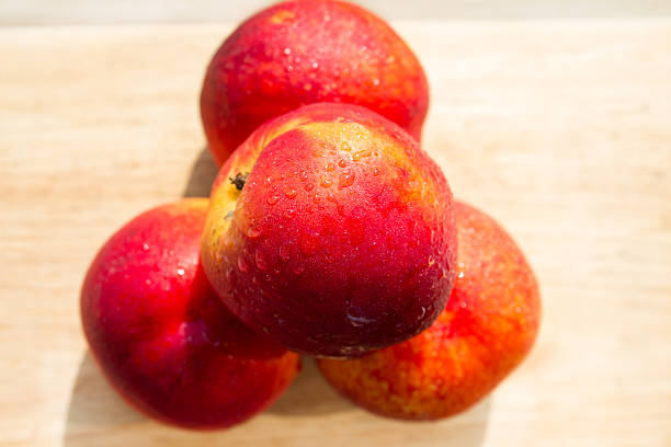 Three nectarine fruits
