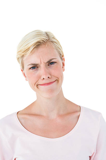 istock Confused blonde woman looking at camera 488483832