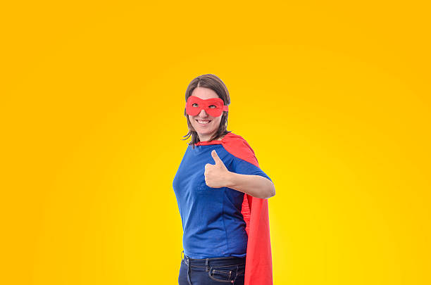 istock Woman superhero with red cape. 488491846
